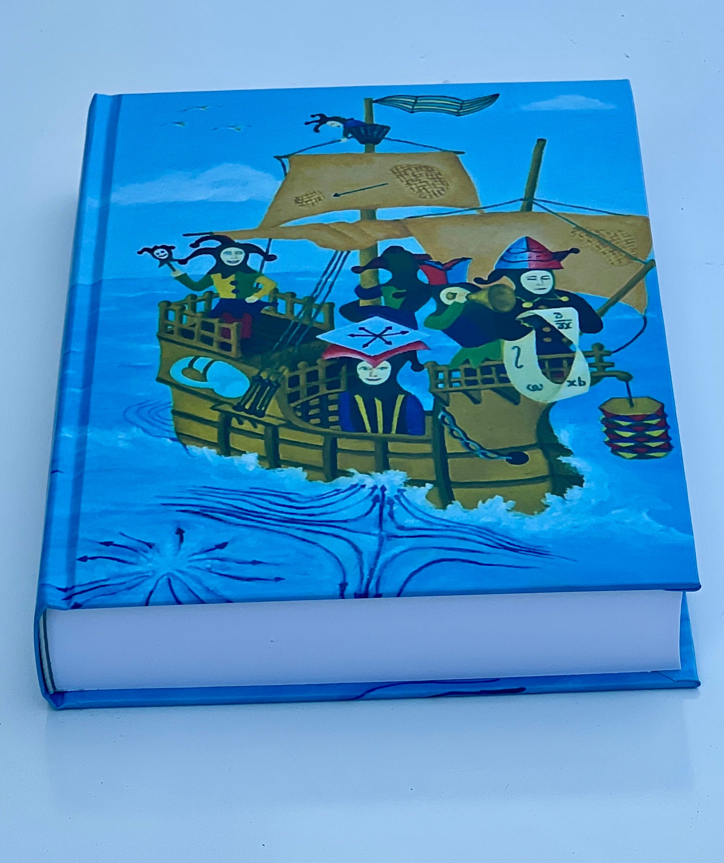 A detailed view of the bottom corner of the front cover, showing a flow line with arrows.
